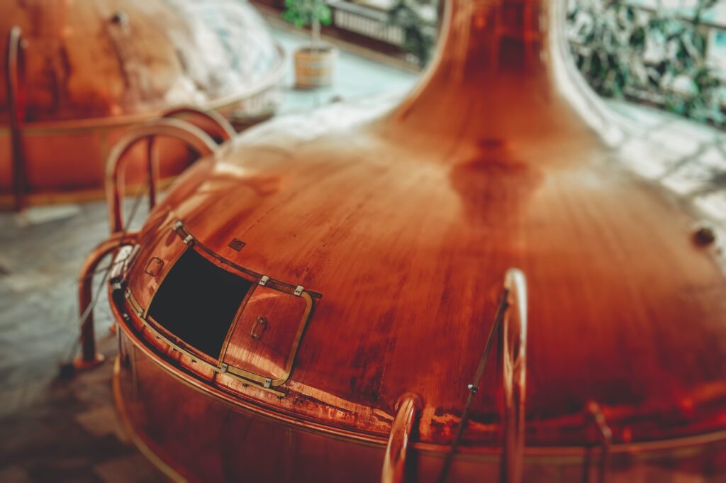 How to make vodka? The production process involves three important steps. The kettle on the picture is used for distillation. 