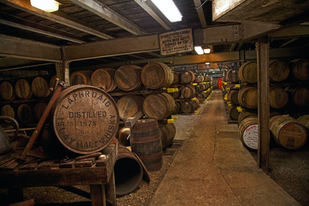 How peated whisky is made? In the production of peated whisky, the malted barley is dried using smoke from burning peat. 